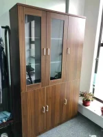 3-door brown office storage cabinet, brown wooden office cabinet with 3 doors, triple door office storage unit, brown office cabinet with doors, modern brown storage cabinet for office, 3-door office cupboard brown finish, brown filing cabinet 3 doors, office storage cabinet wood brown 3-door, spacious brown office storage cabinet, dark brown office cabinet with shelves, executive 3-door storage unit brown, laminated brown office cabinet 3 doors, brown woodgrain office cupboard, three-door wooden storage office cabinet, durable brown office furniture cabinet, brown document storage cabinet with doors, brown office organizer cabinet 3-door, brown MDF 3-door storage cupboard, brown cabinet for files and office supplies, contemporary office storage brown 3 doors, large brown 3-door office cabinet, professional brown office cabinet 3-door, elegant brown triple-door storage unit, and brown executive storage cabinet office use.