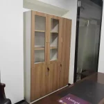 3-door brown office storage cabinet, brown wooden office cabinet with 3 doors, triple door office storage unit, brown office cabinet with doors, modern brown storage cabinet for office, 3-door office cupboard brown finish, brown filing cabinet 3 doors, office storage cabinet wood brown 3-door, spacious brown office storage cabinet, dark brown office cabinet with shelves, executive 3-door storage unit brown, laminated brown office cabinet 3 doors, brown woodgrain office cupboard, three-door wooden storage office cabinet, durable brown office furniture cabinet, brown document storage cabinet with doors, brown office organizer cabinet 3-door, brown MDF 3-door storage cupboard, brown cabinet for files and office supplies, contemporary office storage brown 3 doors, large brown 3-door office cabinet, professional brown office cabinet 3-door, elegant brown triple-door storage unit, and brown executive storage cabinet office use.