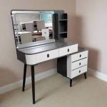 Dressing Table, modern dressing table, wooden dressing table, white dressing table, bedroom dressing table, vanity dressing table, makeup dressing table, dressing table with mirror, dressing table with drawers, dressing table with stool, dressing table with chair, luxury dressing table, small dressing table, large dressing table, compact dressing table, contemporary dressing table, classic dressing table, minimalist dressing table, dressing table with storage, dressing table with shelves, dressing table with cabinet, dressing table with LED mirror, dressing table with lighted mirror, dressing table with round mirror, dressing table with rectangular mirror, dressing table with oval mirror, dressing table with sliding mirror, dressing table with folding mirror, dressing table with hidden storage, dressing table with multiple drawers, dressing table with deep drawers, dressing table with jewelry organizer, dressing table with cosmetic organizer, dressing table for bedroom, dressing table for girls room, dressing table for ladies, dressing table for women, dressing table for teens, dressing table for kids, dressing table for master bedroom, dressing table for guest room, dressing table with cushioned stool, dressing table with upholstered stool, dressing table with padded chair, dressing table with velvet stool, dressing table with leather stool, dressing table with fabric stool, dressing table with mirror and lights, dressing table with Hollywood mirror, dressing table with vanity lights, dressing table with touch light mirror, dressing table with adjustable mirror, dressing table with tilting mirror, dressing table with glass top, dressing table with wooden top, dressing table with marble top, dressing table with laminated finish, dressing table with glossy finish, dressing table with matte finish, dressing table with polished finish, dressing table with oak finish, dressing table with mahogany finish, dressing table with walnut finish, dressing table with MDF material, dressing table with solid wood, dressing table with engineered wood, dressing table with durable frame, dressing table with sturdy legs, dressing table with metal legs, dressing table with wooden legs, dressing table with chrome legs, dressing table with modern design, dressing table with elegant design, dressing table with stylish design, dressing table with luxury finish, dressing table with contemporary style, dressing table with classic style, dressing table with vintage design, dressing table with space-saving design, dressing table for small bedroom, dressing table for large bedroom, dressing table with compact storage, dressing table with wide tabletop, dressing table with spacious drawers, dressing table with hidden compartments, dressing table with side cabinet, dressing table with sliding drawers, dressing table with soft-close drawers, dressing table with organizer tray, dressing table with ring holder, dressing table with necklace hooks, dressing table with makeup compartments, dressing table with hair dryer holder, dressing table with mirror cabinet, dressing table with folding stool, dressing table with removable stool, dressing table with adjustable stool height, dressing table with ergonomic design, dressing table with comfortable seating, dressing table with decorative handles, dressing table with sleek handles, dressing table with metallic handles, dressing table with modern knobs, dressing table with traditional knobs, dressing table with LED strip lighting, dressing table with built-in socket, dressing table with charging port, dressing table with USB port, dressing table with power outlet, dressing table with vanity mirror cabinet, dressing table with drawer dividers, dressing table with cosmetic tray, dressing table with glass mirror frame, dressing table with wooden mirror frame, dressing table with frameless mirror, dressing table with smart mirror, dressing table with Bluetooth mirror, dressing table with anti-fog mirror, dressing table with storage bench, dressing table with side shelves, dressing table with vertical storage, dressing table with horizontal storage, dressing table with elegant aesthetics, dressing table with modern aesthetics, dressing table with minimalist aesthetics, dressing table with high durability, dressing table with premium materials, dressing table with superior craftsmanship, dressing table with easy assembly, dressing table with DIY setup, dressing table with smooth edges, dressing table with rounded corners, dressing table with safety design, dressing table for home use, dressing table for apartment, dressing table for studio apartment, dressing table for hotel room, dressing table for salon, dressing table for beauty studio, dressing table for spa, dressing table for professional makeup, dressing table for daily grooming, dressing table for personal care, dressing table with multi-purpose function, dressing table with integrated wardrobe, dressing table with sliding wardrobe mirror, dressing table with corner design, dressing table with wall-mounted design, dressing table with floating design, dressing table with foldable tabletop, dressing table with extendable tabletop, dressing table with mirror lights and storage, dressing table with premium upholstery stool, dressing table with elegant stool design, dressing table with decorative carving, dressing table with minimalist carving, dressing table with glossy white finish, dressing table with black finish, dressing table with brown finish, dressing table with cream finish, dressing table with pastel finish, dressing table with gold accents, dressing table with silver accents, dressing table with decorative mirror frame, dressing table with contemporary mirror style, dressing table with beveled mirror edges, dressing table with artistic design, dressing table with compact footprint, dressing table with ample legroom, dressing table with stylish appearance, dressing table with fashionable look, dressing table with elegant touch, dressing table with space optimization, dressing table with multifunctional storage, dressing table with organized compartments, dressing table with premium hardware, dressing table with durable hinges, dressing table with sturdy construction, dressing table with reinforced frame, dressing table with scratch-resistant surface, dressing table with waterproof surface, dressing table with easy-clean finish, dressing table with maintenance-free surface, dressing table with child-friendly design, dressing table with eco-friendly material, dressing table with sustainable wood, dressing table with modern bedroom appeal, dressing table with luxury bedroom style, dressing table with contemporary bedroom décor, dressing table with classic bedroom décor, dressing table with elegant bedroom furniture design, dressing table with professional makeup setup, dressing table with beauty station layout, dressing table with organized vanity space, dressing table with stylish mirror cabinet, dressing table with functional drawer system, dressing table with premium look and feel, dressing table with aesthetic appeal, dressing table with home décor enhancement, dressing table with trendy design, dressing table with sleek profile, dressing table with compact elegance, dressing table with designer finish, dressing table with decorative accents, dressing table with glamorous style, dressing table with timeless design, dressing table with modern functionality, dressing table with high-end craftsmanship, dressing table with smart storage solution, dressing table with elegant mirror lighting, dressing table with ergonomic seating arrangement, dressing table with comfort-focused design, dressing table with elegant wood texture, dressing table with luxury aesthetics, dressing table with modern glam style, dressing table with minimalist charm, dressing table with sophisticated detailing, dressing table with contemporary elegance, dressing table with chic style, dressing table with premium bedroom furniture appeal, dressing table with organized beauty storage, dressing table with versatile layout, dressing table with space-efficient structure, dressing table with fashionable bedroom design, dressing table with elegant finishing touches, dressing table with durable craftsmanship, dressing table with premium-quality materials, dressing table with modern living style, dressing table with classy look, dressing table with decorative appeal, dressing table with refined aesthetics, dressing table with functional elegance, dressing table with timeless bedroom style Dressing Table in Nairobi, Dressing Table in Mombasa, Dressing Table in Kisumu, Dressing Table in Nakuru, Dressing Table in Eldoret, Dressing Table in Thika, Dressing Table in Malindi, Dressing Table in Kitale, Dressing Table in Garissa, Dressing Table in Kakamega, Dressing Table in Nyeri, Dressing Table in Machakos, Dressing Table in Meru, Dressing Table in Kericho, Dressing Table in Embu, Dressing Table in Migori, Dressing Table in Homa Bay, Dressing Table in Naivasha, Dressing Table in Voi, Dressing Table in Kilifi, Dressing Table in Bungoma, Dressing Table in Narok, Dressing Table in Isiolo, Dressing Table in Nanyuki, Dressing Table in Lamu, Dressing Table in Busia, Dressing Table in Siaya, Dressing Table in Murang’a, Dressing Table in Kiambu, Dressing Table in Makueni, Dressing Table in Taveta, Dressing Table in Wajir, Dressing Table in Mandera, Dressing Table in Marsabit, Dressing Table in Kapenguria, Dressing Table in Lodwar, Dressing Table in Bomet, Dressing Table in Kapsabet, Dressing Table in Chuka, Dressing Table in Karatina, Dressing Table in Kerugoya, Dressing Table in Othaya, Dressing Table in Ruiru, Dressing Table in Kikuyu, Dressing Table in Limuru, Dressing Table in Athi River, Dressing Table in Ngong, Dressing Table in Kajiado, Dressing Table in Kitengela, Dressing Table in Moyale, Dressing Table in Maralal, Dressing Table in Hola, Dressing Table in Mpeketoni, Dressing Table in Webuye, Dressing Table in Mumias, Dressing Table in Malaba, Dressing Table in Ugunja, Dressing Table in Ukwala, Dressing Table in Bondo, Dressing Table in Mbita, Dressing Table in Oyugis, Dressing Table in Litein, Dressing Table in Sotik, Dressing Table in Nyamira, Dressing Table in Kisii, Dressing Table in Kehancha, Dressing Table in Kilgoris, Dressing Table in Rumuruti, Dressing Table in Gilgil, Dressing Table in Molo, Dressing Table in Njoro, Dressing Table in Bahati, Dressing Table in Subukia, Dressing Table in Londiani, Dressing Table in Muhoroni, Dressing Table in Awendo, Dressing Table in Isebania, Dressing Table in Namanga, Dressing Table in Diani, Dressing Table in Ukunda, Dressing Table in Garsen, Dressing Table in Wundanyi, Dressing Table in Vihiga, Dressing Table in Luanda, Dressing Table in Kendu Bay, Dressing Table in Kapsowar, Dressing Table in Iten, Dressing Table in Kabarnet, Dressing Table in Maragua, Dressing Table in Kangundo, Dressing Table in Yatta, Dressing Table in Kiserian, Dressing Table in Nyahururu, Dressing Table in Laikipia, Dressing Table in Taita Taveta, Dressing Table in Trans Nzoia, Dressing Table in Baringo, Dressing Table in Kitui, Dressing Table in Mwingi, Dressing Table in Kikambala, Dressing Table in Bamburi, Dressing Table in Nyali, Dressing Table in Westlands, Dressing Table in Karen, Dressing Table in Runda, Dressing Table in Lavington, Dressing Table in Kileleshwa, Dressing Table in Kilimani, Dressing Table in Parklands, Dressing Table in Eastleigh, Dressing Table in South B, Dressing Table in South C, Dressing Table in Embakasi, Dressing Table in Donholm, Dressing Table in Umoja, Dressing Table in Kayole, Dressing Table in Kasarani, Dressing Table in Roysambu, Dressing Table in Zimmerman, Dressing Table in Githurai, Dressing Table in Kahawa West, Dressing Table in Kahawa Sukari, Dressing Table in Ruaka, Dressing Table in Banana Hill, Dressing Table in Syokimau, Dressing Table in Mlolongo, Dressing Table in Juja, Dressing Table in Rongai, Dressing Table in Pipeline, Dressing Table in Dagoretti, Dressing Table in Kitusuru, Dressing Table in Ngara, Dressing Table in Pangani, Dressing Table in Buruburu, Dressing Table in Tassia, Dressing Table in Chokaa, Dressing Table in Athi River EPZ, Dressing Table in Industrial Area Nairobi, Dressing Table in Upper Hill, Dressing Table in CBD Nairobi, Dressing Table in Gikambura, Dressing Table in Tigoni, Dressing Table in Mai Mahiu, Dressing Table in Elementaita, Dressing Table in Ol Kalou, Dressing Table in Nyandarua, Dressing Table in Keroka, Dressing Table in Suneka, Dressing Table in Oyugis Town, Dressing Table in Mbale, Dressing Table in Taveta Town, Dressing Table in Vihiga Town, Dressing Table in Maralal Town, Dressing Table in Kajiado Town, Dressing Table in Ngong Town, Dressing Table in Kitengela Town, Dressing Table in Limuru Town, Dressing Table in Kikuyu Town, Dressing Table in Ruiru Town, Dressing Table in Thika Town, Dressing Table in Machakos Town, Dressing Table in Kitui Town, Dressing Table in Garissa Town, Dressing Table in Mandera Town, Dressing Table in Wajir Town, Dressing Table in Isiolo Town, Dressing Table in Marsabit Town, Dressing Table in Lodwar Town, Dressing Table in Kapenguria Town, Dressing Table in Kakamega Town, Dressing Table in Bungoma Town, Dressing Table in Busia Town, Dressing Table in Kisii Town, Dressing Table in Nyamira Town, Dressing Table in Migori Town, Dressing Table in Homa Bay Town, Dressing Table in Siaya Town, Dressing Table in Kisumu Town, Dressing Table in Eldoret Town, Dressing Table in Nakuru Town, Dressing Table in Naivasha Town, Dressing Table in Kericho Town, Dressing Table in Bomet Town, Dressing Table in Embu Town, Dressing Table in Meru Town, Dressing Table in Nyeri Town, Dressing Table in Nanyuki Town, Dressing Table in Malindi Town, Dressing Table in Kilifi Town, Dressing Table in Mombasa CBD, Dressing Table in Kisumu CBD, Dressing Table in Nakuru CBD, Dressing Table in Eldoret CBD, Dressing Table in Thika CBD, Dressing Table in Nyeri CBD, Dressing Table in Meru CBD, Dressing Table in Embu CBD, Dressing Table in Kakamega CBD, Dressing Table in Bungoma CBD, Dressing Table in Kericho CBD, Dressing Table in Kisii CBD, Dressing Table in Garissa CBD, Dressing Table in Kitale CBD, Dressing Table in Lodwar CBD, Dressing Table in Marsabit CBD, Dressing Table in Narok CBD, Dressing Table in Nanyuki CBD, Dressing Table in Naivasha CBD, Dressing Table in Voi CBD, Dressing Table in Kilifi CBD, Dressing Table in Malindi CBD, Dressing Table in Ukunda CBD, Dressing Table in Diani Beach, Dressing Table in Watamu, Dressing Table in Kilgoris Town, Dressing Table in Kehancha Town, Dressing Table in Molo Town, Dressing Table in Gilgil Town, Dressing Table in Njoro Town, Dressing Table in Bahati Town, Dressing Table in Subukia Town, Dressing Table in Londiani Town, Dressing Table in Muhoroni Town, Dressing Table in Awendo Town, Dressing Table in Isebania Town, Dressing Table in Namanga Town, Dressing Table in Garsen Town, Dressing Table in Wundanyi Town, Dressing Table in Luanda Town, Dressing Table in Kendu Bay Town, Dressing Table in Kapsabet Town, Dressing Table in Kabarnet Town, Dressing Table in Iten Town, Dressing Table in Maragua Town, Dressing Table in Kangundo Town, Dressing Table in Yatta Town, Dressing Table in Kiserian Town, Dressing Table in Nyahururu Town